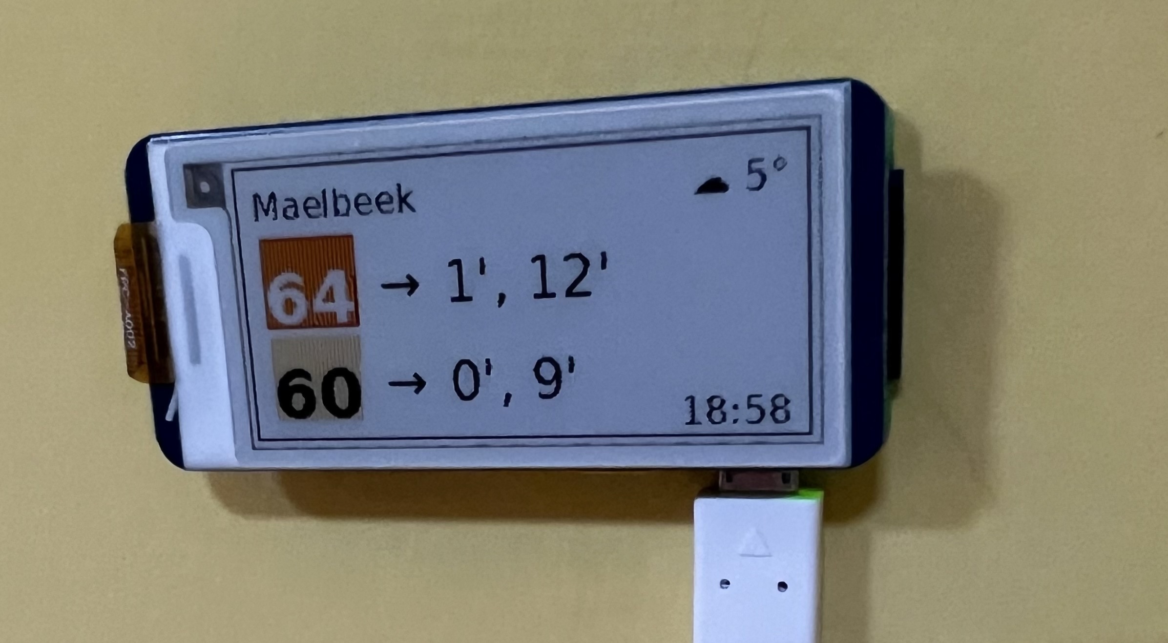 Display Example showing bus waiting times and weather information